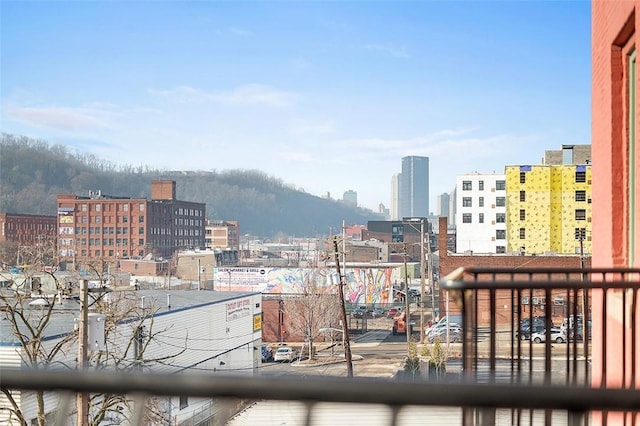 balcony featuring a city view