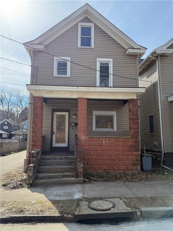 view of front of property with entry steps and a porch