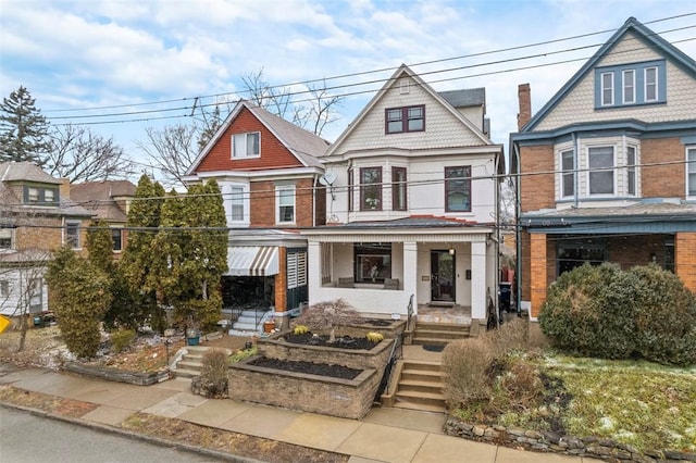 view of front of home featuring a balcony