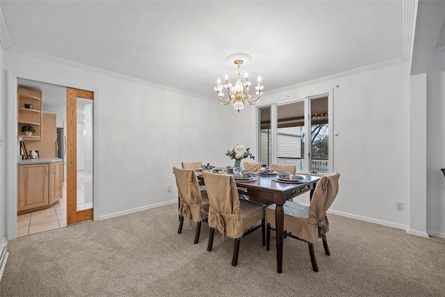 dining area featuring a notable chandelier, crown molding, baseboards, and light colored carpet