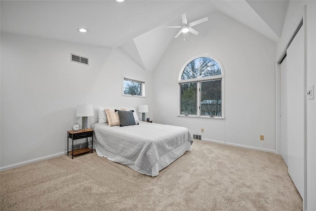 carpeted bedroom featuring recessed lighting, visible vents, and baseboards