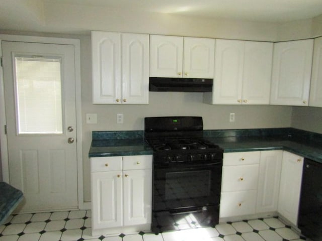 kitchen with under cabinet range hood, white cabinetry, black gas stove, light floors, and dark countertops