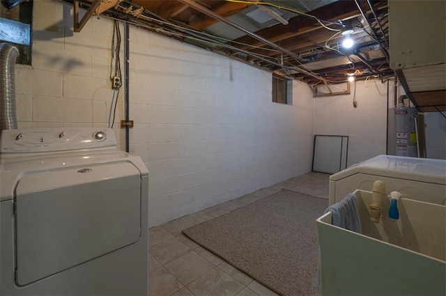 laundry area featuring washer and dryer, laundry area, and water heater