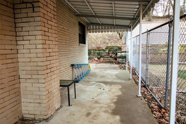 view of patio featuring fence