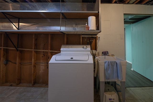 washroom featuring laundry area, washer / clothes dryer, and tile patterned floors