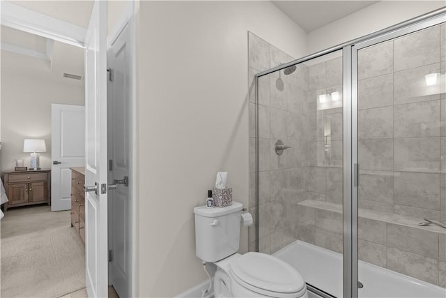 full bath with toilet, a shower stall, and visible vents