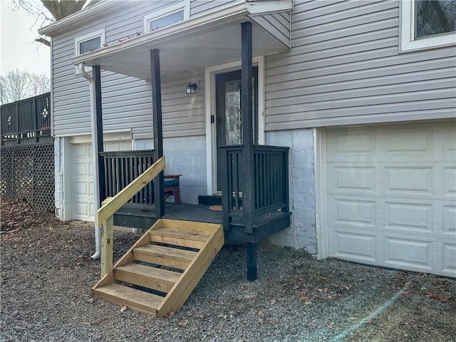 property entrance with a garage