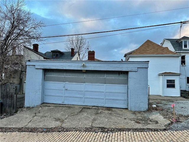 garage featuring fence