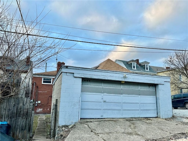 detached garage with fence