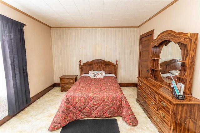 bedroom with crown molding, baseboards, and light colored carpet