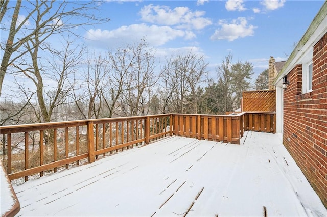 view of snow covered deck