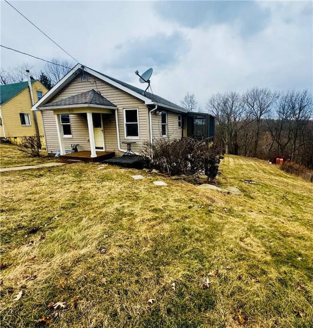 view of front of home with a front yard