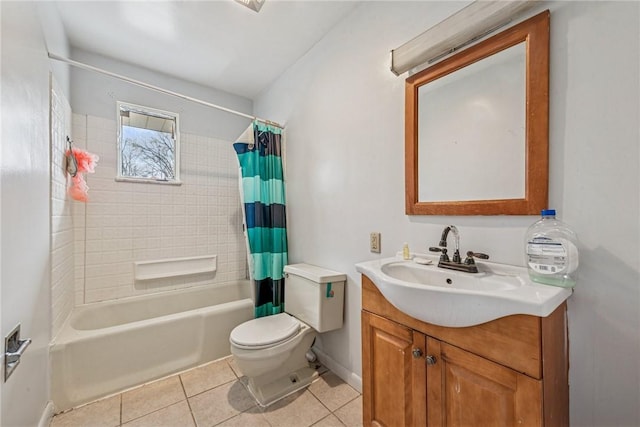 bathroom with toilet, shower / bath combo, vanity, baseboards, and tile patterned floors