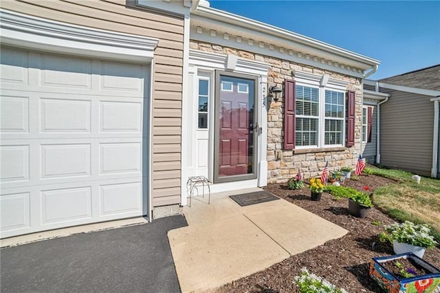 entrance to property with stone siding