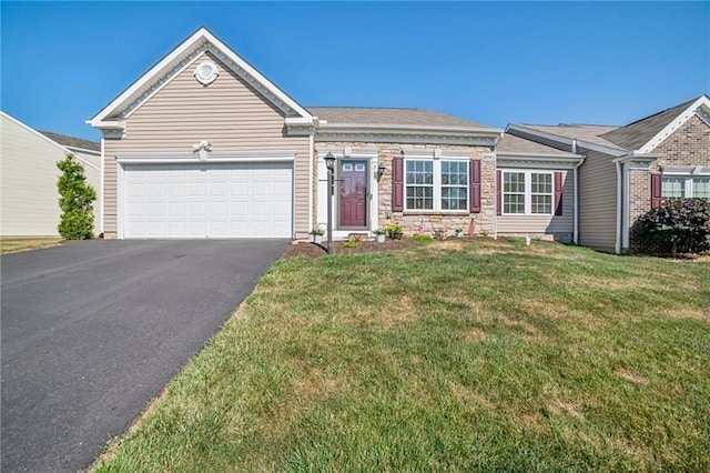 single story home featuring a front yard, stone siding, driveway, and an attached garage