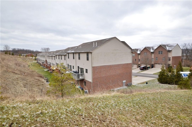 view of side of property with a residential view