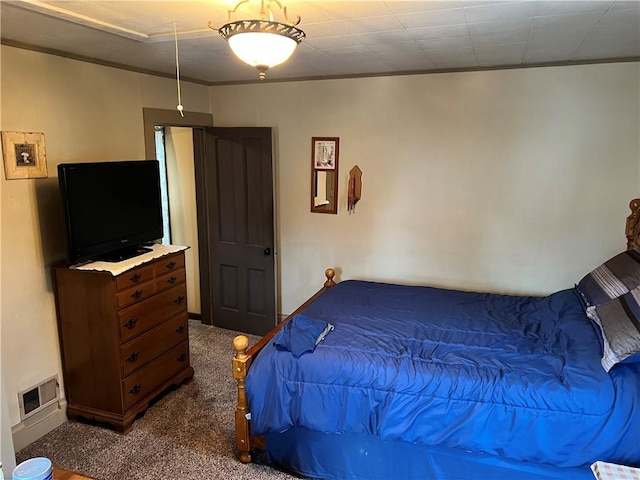 bedroom with carpet floors and visible vents