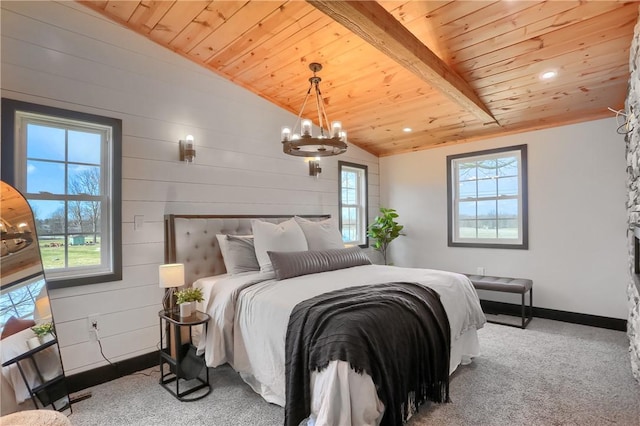 bedroom with vaulted ceiling with beams, carpet floors, and wooden ceiling