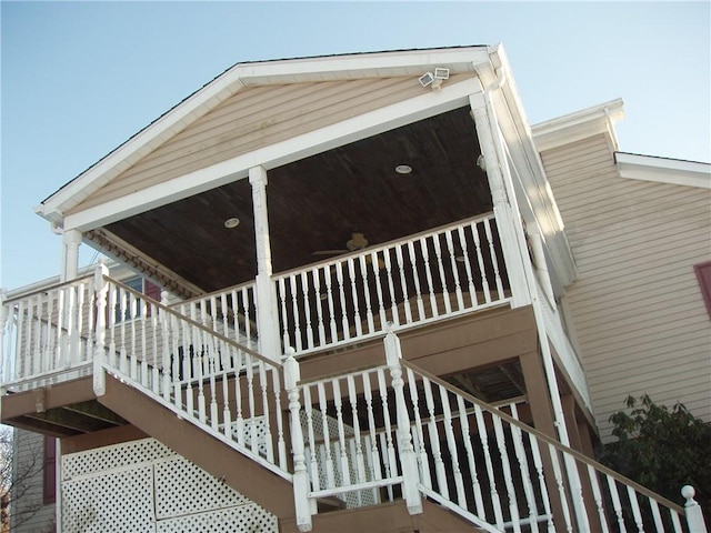 view of side of property with stairway