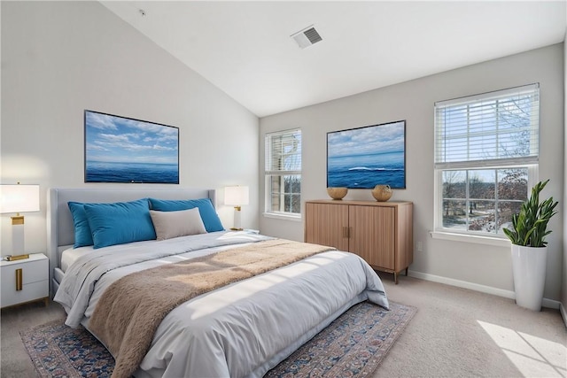 bedroom featuring lofted ceiling, visible vents, light carpet, and baseboards