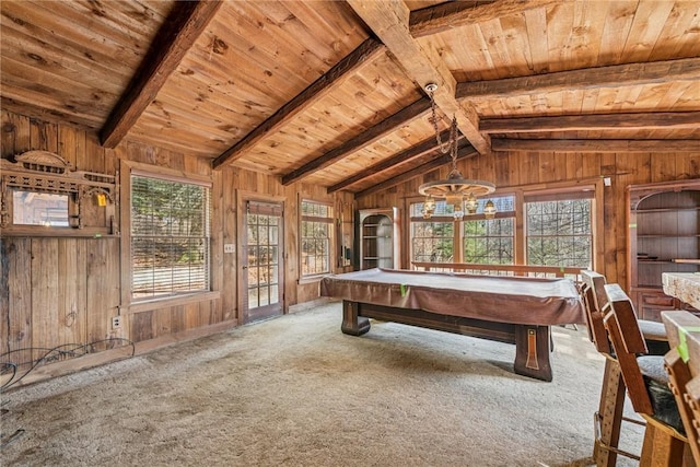 rec room with wooden ceiling, wood walls, and carpet floors