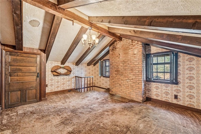 additional living space featuring vaulted ceiling with beams, carpet floors, an inviting chandelier, and wallpapered walls