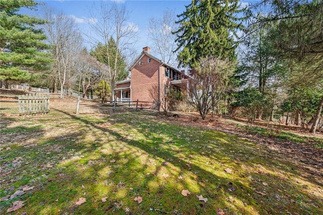 view of yard with fence