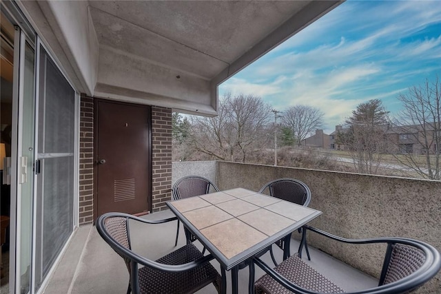 balcony featuring outdoor dining area