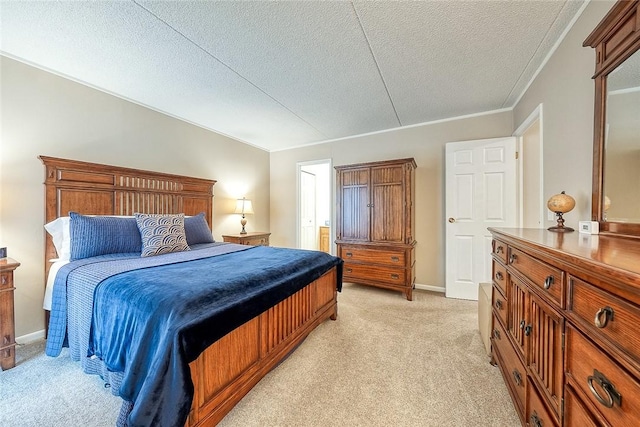 bedroom with light carpet, baseboards, ornamental molding, and a textured ceiling