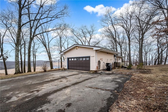 garage with driveway