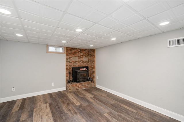 unfurnished living room with recessed lighting, dark wood-style flooring, visible vents, and baseboards