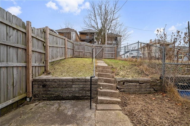 view of yard featuring a fenced backyard