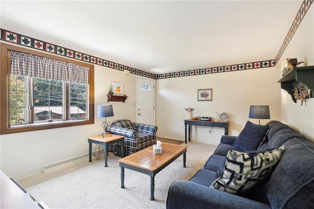 living area with carpet floors and a baseboard radiator