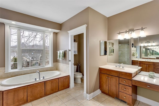 full bathroom featuring tile patterned flooring, a healthy amount of sunlight, a shower stall, and a bath