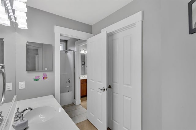 full bathroom featuring tile patterned flooring, vanity, and shower / bathtub combination