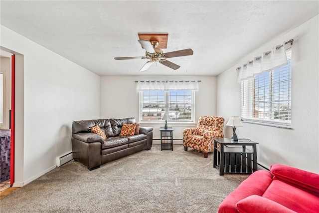 living room featuring baseboards, a ceiling fan, a baseboard radiator, carpet floors, and a baseboard heating unit