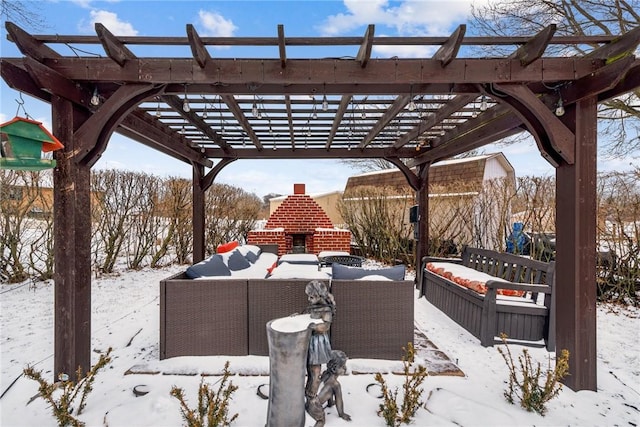 exterior space with an outdoor living space with a fireplace and a pergola