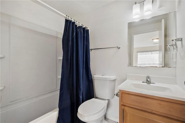 bathroom featuring vanity, shower / bath combo with shower curtain, and toilet