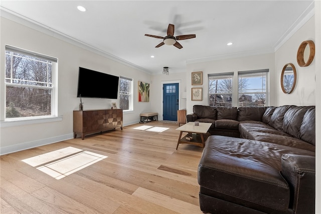 living area featuring recessed lighting, light wood-style flooring, and crown molding