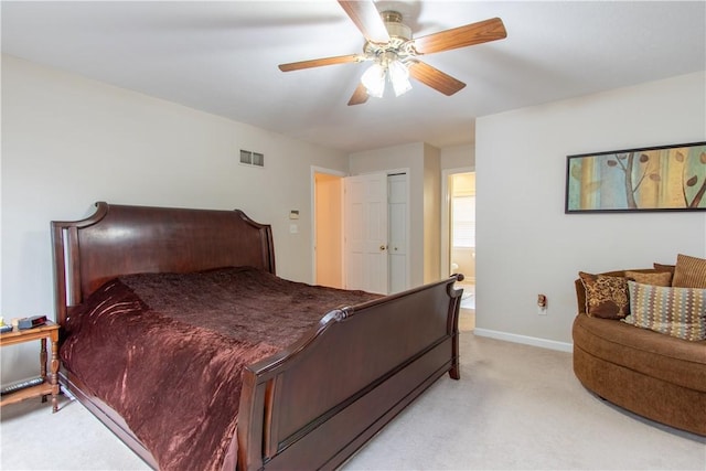 bedroom featuring light carpet, ceiling fan, visible vents, and baseboards