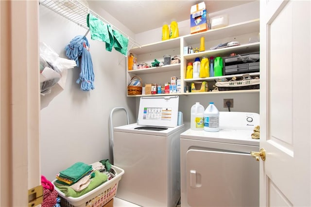 laundry area featuring laundry area and washing machine and clothes dryer