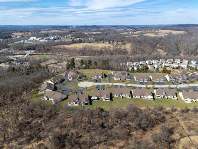 birds eye view of property with a residential view