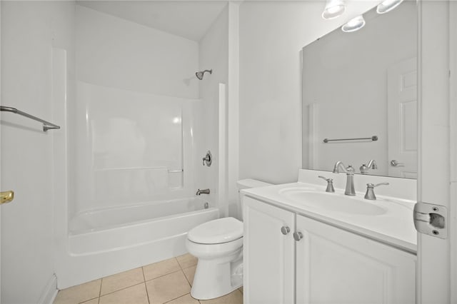 bathroom featuring toilet, vanity, tub / shower combination, and tile patterned floors