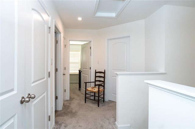 corridor with recessed lighting and light colored carpet