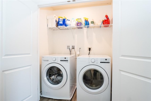 laundry area featuring laundry area and independent washer and dryer