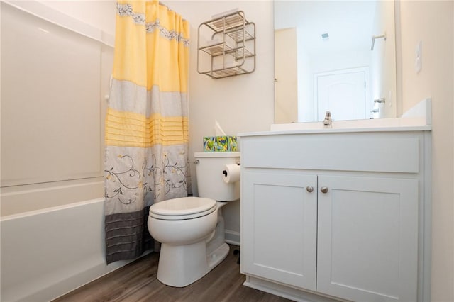 full bath featuring shower / bathtub combination with curtain, vanity, toilet, and wood finished floors