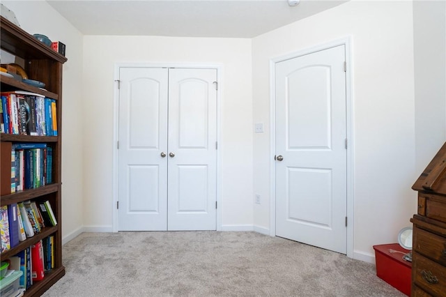 108 Sweetwater Dr, Moon/Crescent Twp, PA 15108 - unfurnished bedroom featuring carpet floors, a closet, and baseboards