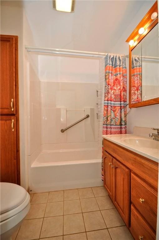 full bath featuring shower / bath combo, vanity, toilet, and tile patterned floors