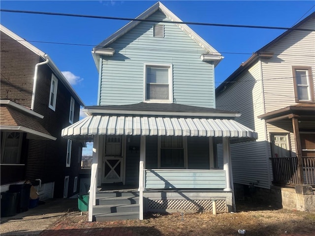 view of front of property featuring covered porch