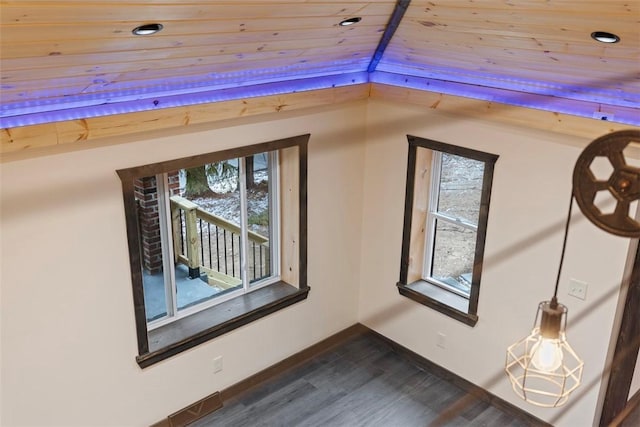 interior details featuring recessed lighting, wood ceiling, baseboards, and wood finished floors